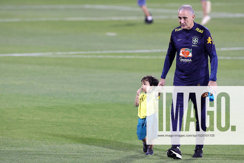 Brazil Training Session - FIFA World Cup, WM, Weltmeisterschaft, Fussball Qatar 2022 Head Copach of Brazil Tite plays with children during Brazil training session at Al Arabi SC Stadium in Doha, Qatar on December 6, 2022. GoranxStanzl PIXSELL