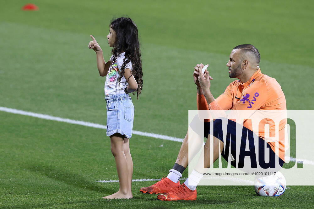 Brazil Training Session - FIFA World Cup, WM, Weltmeisterschaft, Fussball Qatar 2022 Weverton of Brazil plays with children during Brazil training session at Al Arabi SC Stadium in Doha, Qatar on December 6, 2022. GoranxStanzl PIXSELL
