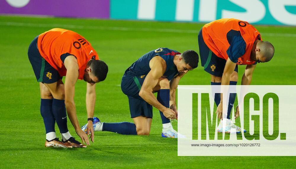 Mandatory Credit: Photo by Javier Garcia Shutterstock (13655708t) Cristiano Ronaldo of Portugal ties his laces during training as team mates stretch Portugal Training, FIFA World Cup, WM, Weltmeisterschaft, Fussball 2022, Football, Al Shahaniya SC Training Site, Al Shahaniya, Qatar - 08 Dec 2022 Editorial Use Only Portugal Training, FIFA World Cup 2022, Football, Al Shahaniya SC Training Site, Al Shahaniya, Qatar - 08 Dec 2022 Editorial Use Only