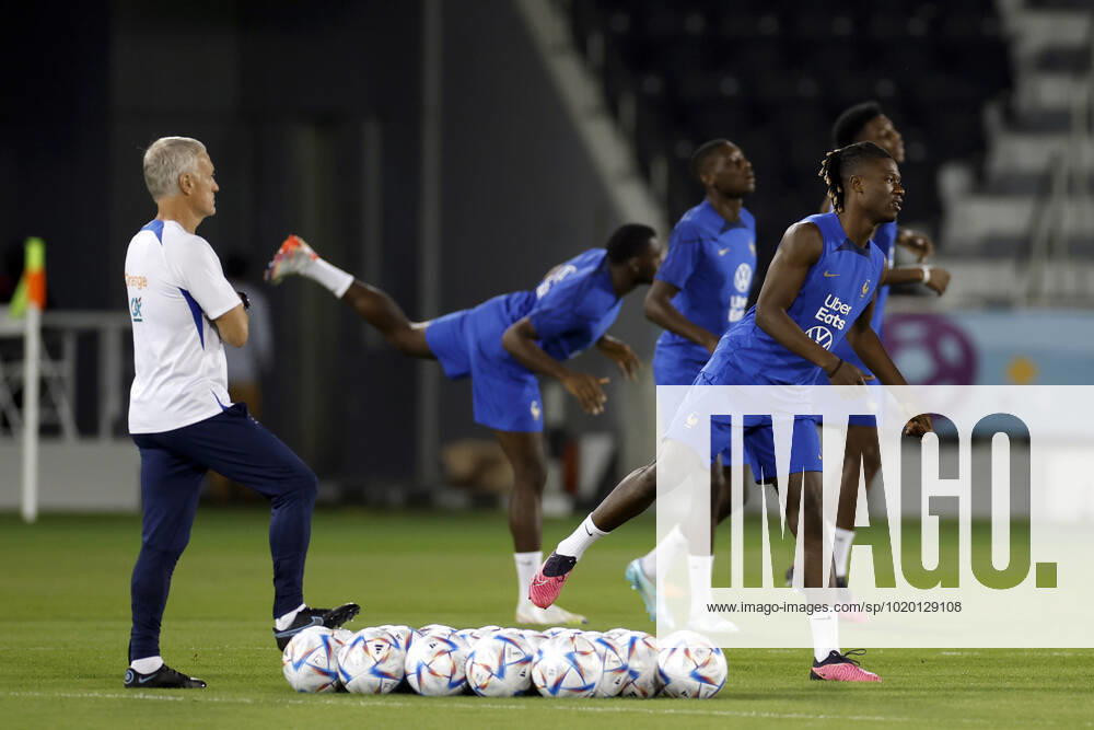 France s midfielder Eduardo Camavinga (R) and head coach Didier Deschamps (L) take part in a training session held at Al Sadd Stadium, in Doha, Qatar, 08 December 2022. France will face England in their FIFA World Cup, WM, Weltmeisterschaft, Fussball 2022 quarter final soccer match on 10 December. France s training session !ACHTUNG: NUR REDAKTIONELLE NUTZUNG!