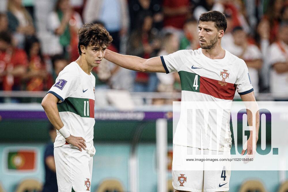 Morocco vs portugal DOHA, CA - 10.12.2022: MOROCCO VS PORTUGAL - RUBEN DIAS from Portugal consoles JOAO FELIX from Portugal after the match between Morocco and Portugal, valid for the quarterfinals of the World Cup, held at the Al Thumama Stadium in Doha, Qatar. (Photo: Marcelo Machado de Melo Fotoarena) x2308627x MarceloxMachadoxdexMelo