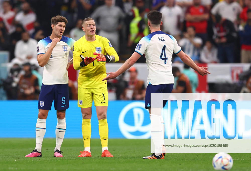 Al Khor, Qatar, 10th December 2022. Declan Rice of England holds an inquest with John Stones of England and Jordan Pickford of England during the FIFA World Cup, WM, Weltmeisterschaft, Fussball 2022 match at Al Bayt Stadium, Al Khor. Picture credit should read: David Klein Sportimage . SPI-2092-0063