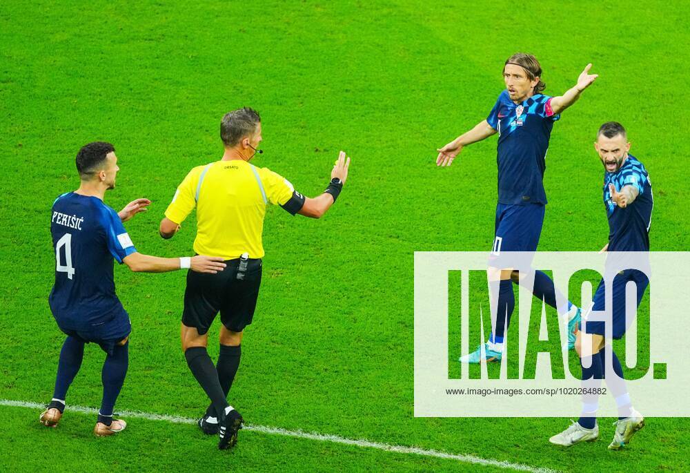 Mandatory Credit: Photo by Javier Garcia Shutterstock (13661834ad) Referee Daniele Orsato is confronted by Luka Modric ,Dejan Lovren and Ivan Perisic of Croatia after a foul Argentina v Croatia, FIFA World Cup, WM, Weltmeisterschaft, Fussball 2022, Semi Final, Football, Lusail Stadium, Al Daayen, Qatar - 13 Dec 2022 Editorial Use Only Argentina v Croatia, FIFA World Cup 2022, Semi Final, Football, Lusail Stadium, Al Daayen, Qatar - 13 Dec 2022 Editorial Use Only
