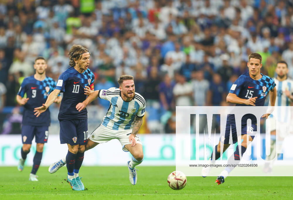 Mandatory Credit: Photo by Kieran McManus Shutterstock (13661829u) Luka Modric of Croatia tackles Alexis Mac Allister of Argentina Argentina v Croatia, FIFA World Cup, WM, Weltmeisterschaft, Fussball 2022, Semi Final, Football, Lusail Stadium, Al Daayen, Qatar - 13 Dec 2022 Editorial Use Only Argentina v Croatia, FIFA World Cup 2022, Semi Final, Football, Lusail Stadium, Al Daayen, Qatar - 13 Dec 2022 Editorial Use Only