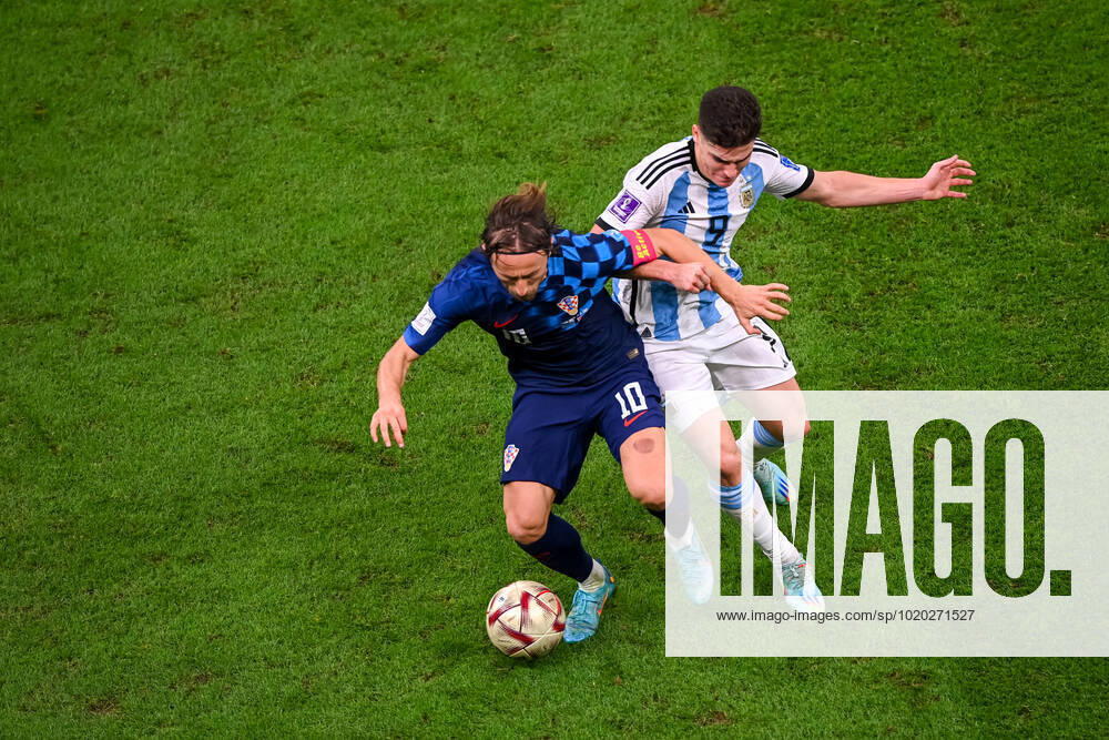 FOOTBALL World Cup 2022 semifinal Argentina Croatia 13 12 2022 Luka Modric Croatia left against Julian Ãlvarez Argentina