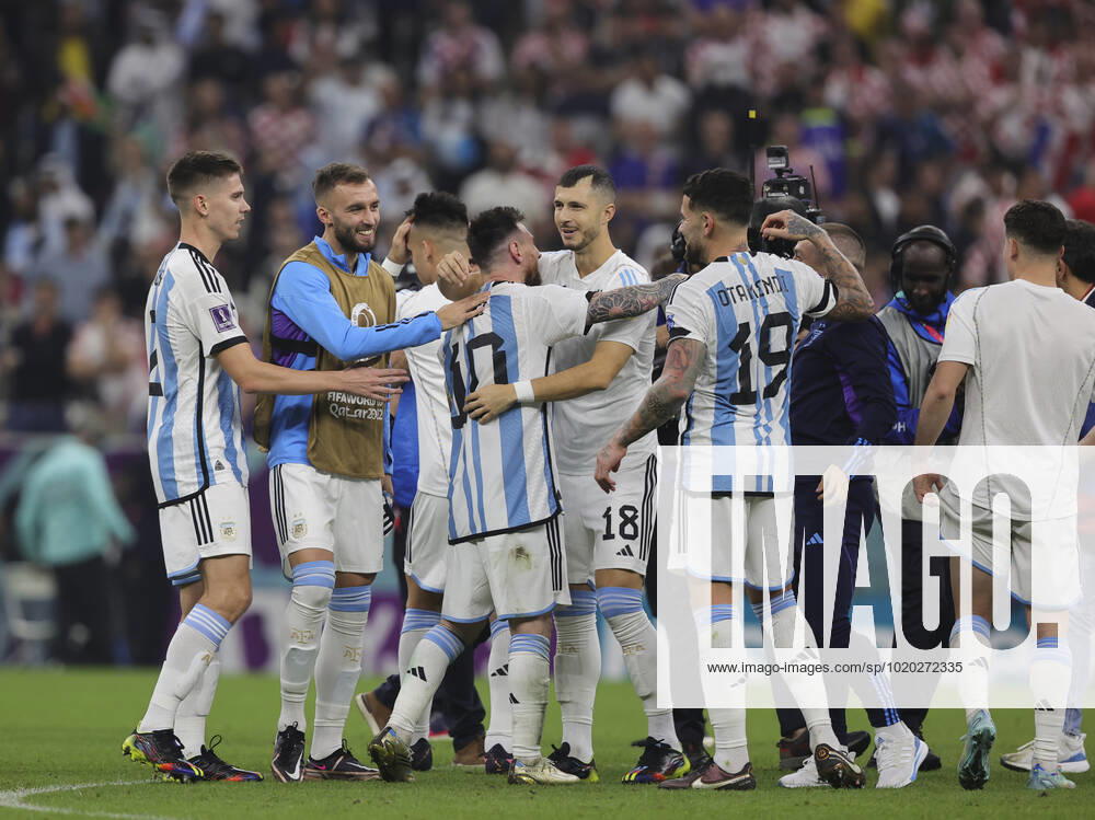 Argentina v Croatia 2022 FIFA World Cup, WM, Weltmeisterschaft, Fussball Lionel Messi of Argentina is swamped by his team-mates after the 2022 FIFA World Cup Semi-final match at Lusail Stadium, Lusail Content Not Available For UK Newspapers