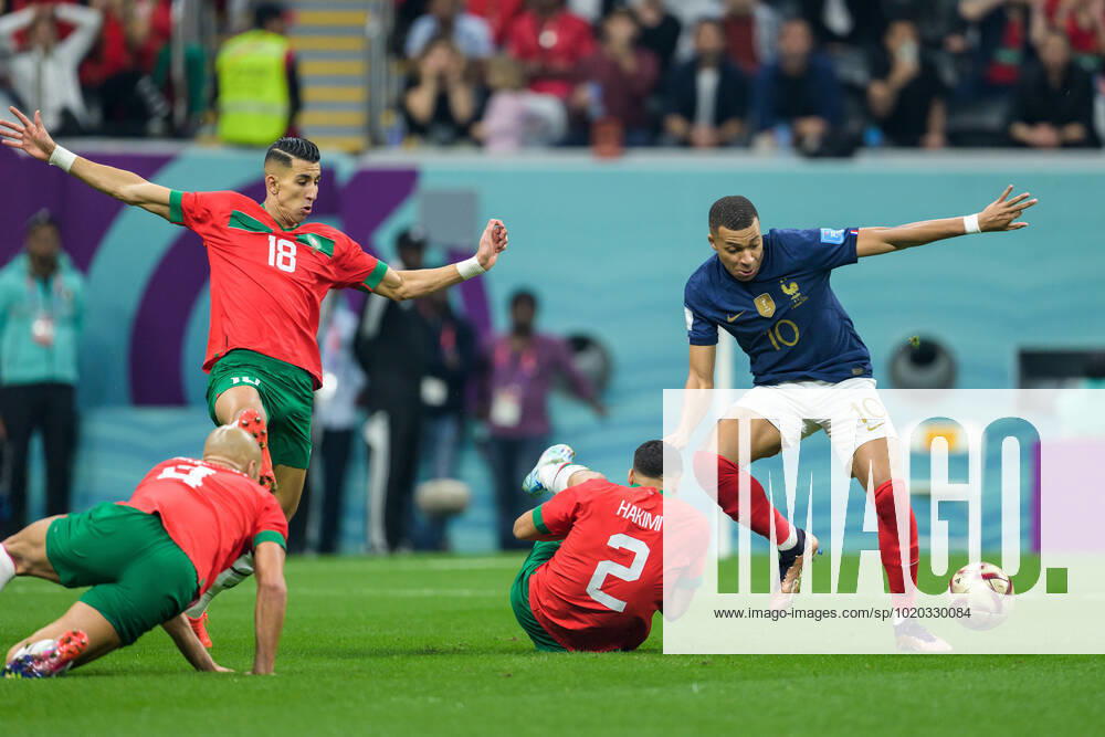 Sofyan Amrabat, Jawad El Yamiq and Achraf Hakimi of Morocco against Kylian Mbappe of France during the FIFA World Cup 2022 semifinal between France and Morocco on December 14, 2022 in Doha Photo Joel Marklund BILDBYRAN code JM JM0412 bbeng football football soccer football world cup football world cup football world cup 2022 fifa world cup 2022 semi final semi final france france morocco morocco,