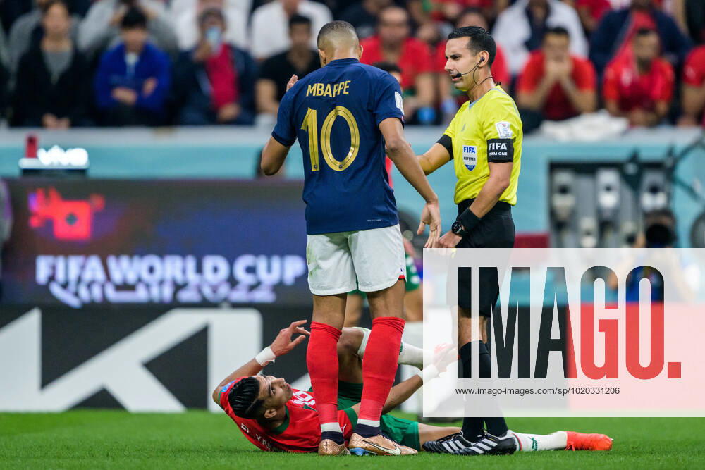 Jawad El Yamiq of Morocco in a discussion with Kylian Mbappe of France during the FIFA World Cup 2022 semifinal between France and Morocco on December 14, 2022 in Doha Photo Joel Marklund BILDBYRAN code JM JM0412 bbeng football football soccer fotball vm fotbols vm fotball vm fotbols world cup 2022 fifa world cup 2022 semi final semi final france france morocco morocco,