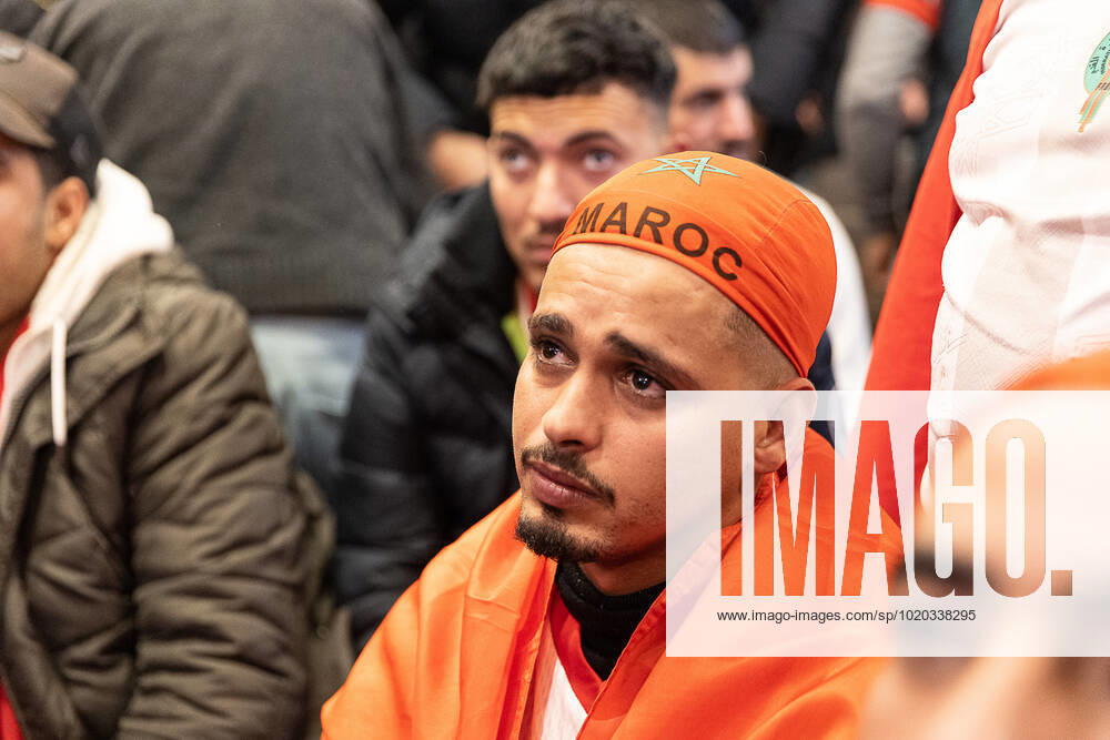 Illustration picture shows people showing dejection after Morocco lost the semi-final match of Morocco vs France, at the FIFA 2022 World Cup, at a tea house - cafetaria Tetouan in the center of Brussels, on Wednesday 14 December 2022. JAMESxARTHURxGEKIERE x56184954x