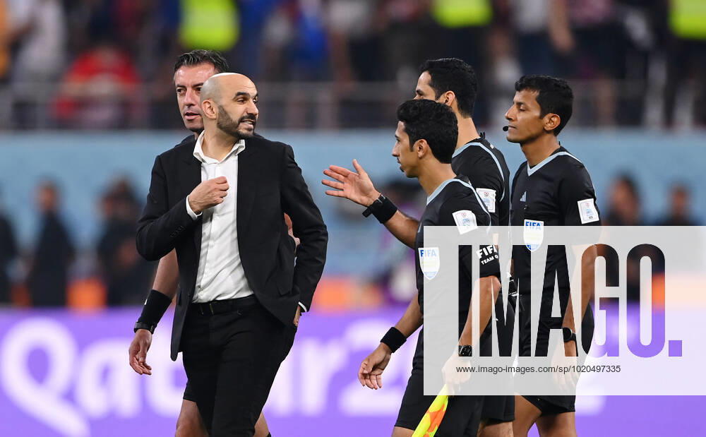 FOOTBALL World Cup 2022 Match for 3rd place Croatia Morocco 17 12 2022 Coach Walid Regragui left, Morocco discusses upset with referee team after final whistle Assistant referee Taleb Al Marri front, Qatar , referee Abdulrahman Al Jassim center covered, Qatar and assistant referee Saud Al Maqaleh Qatar and fourth official Raphael Claus left back, Brazil