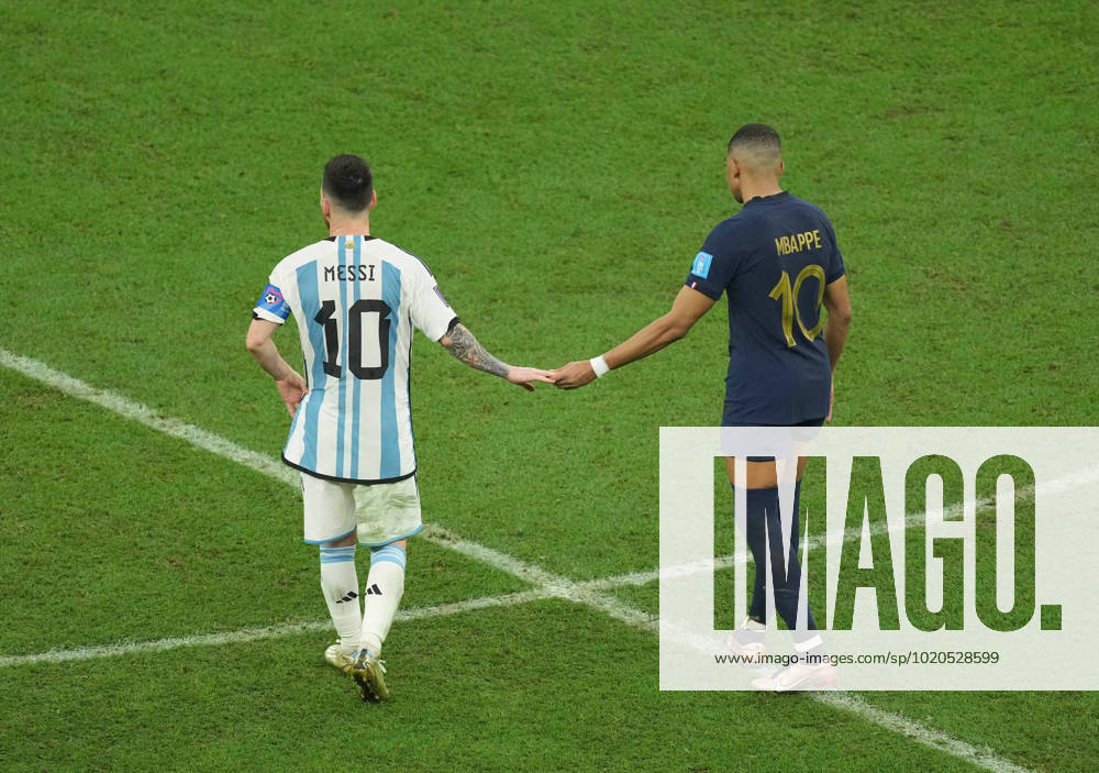 KW50 (221218) -- LUSAIL, Dec. 18, 2022 -- Lionel Messi (L) of Argentina greets Kylian Mbappe of France during the Final between Argentina and France at the 2022 FIFA World Cup, WM, Weltmeisterschaft, Fussball at Lusail Stadium in Lusail, Qatar, Dec. 18, 2022. ) (SP)QATAR-LUSAIL-2022 WORLD CUP-FINAL-ARG VS FRA PanxYulong