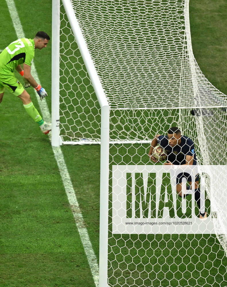 (221218) -- LUSAIER, Dec. 18, 2022 -- Kylian Mbappe (R) of France celebrates his goal during the Final between Argentina and France at the 2022 FIFA World Cup, WM, Weltmeisterschaft, Fussball at Lusail Stadium in Lusail, Qatar, Dec. 18, 2022. ) (SP)QATAR-LUSAIL-2022 WORLD CUP-FINAL-ARG VS FRA XiaoxYijiu