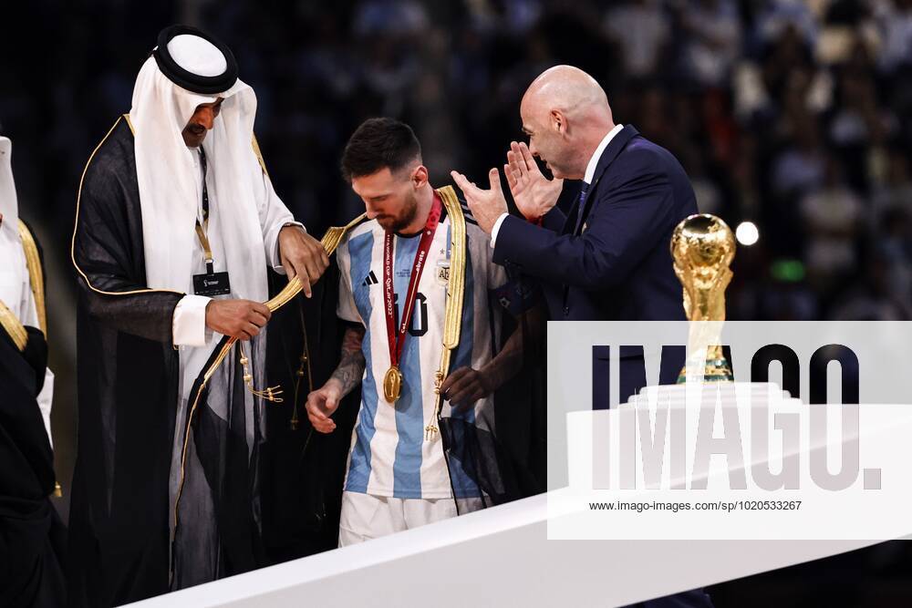 AL DAAYEN lr Emir of Qatar Sheikh Tamim bin Hamad Al Thani, Lionel Messi of Argentina and FIFA President Gianni Infantino with the world cup trophy, FIFA World Cup Trophy after the FIFA World Cup Qatar 2022 final match between Argentina and France at the Lusail Stadium on December 18, 2022 in Al Daayen, Qatar AP Dutch Height MAURICE OF STONE FIFA World Cup Qatar 2022 2022 ANPxSportx xMauricexvanxSteenxWKxIVx 459613737 originalFilename: 459613737