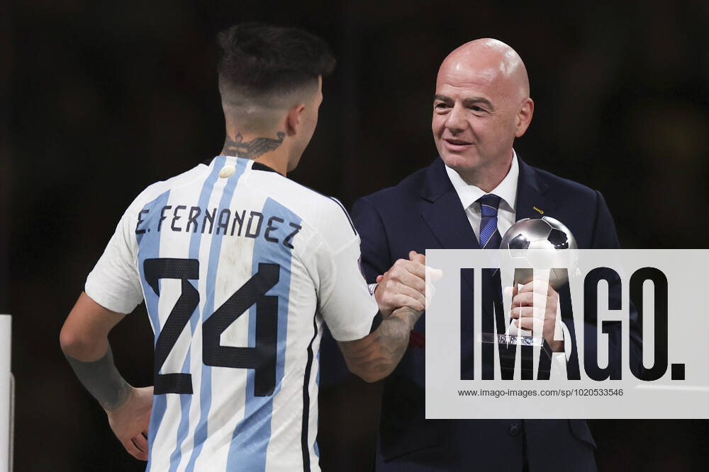 (221218) -- LUSAIL, Dec. 18, 2022 -- FIFA President Gianni Infantino (R) presents the young player award to Enzo Fernandez of Argentina during the awarding ceremony of the 2022 FIFA World Cup, WM, Weltmeisterschaft, Fussball at Lusail Stadium in Lusail, Qatar, Dec. 18, 2022. ) (SP)QATAR-LUSAIL-2022 WORLD CUP-FINAL-ARG VS FRA CaoxCan