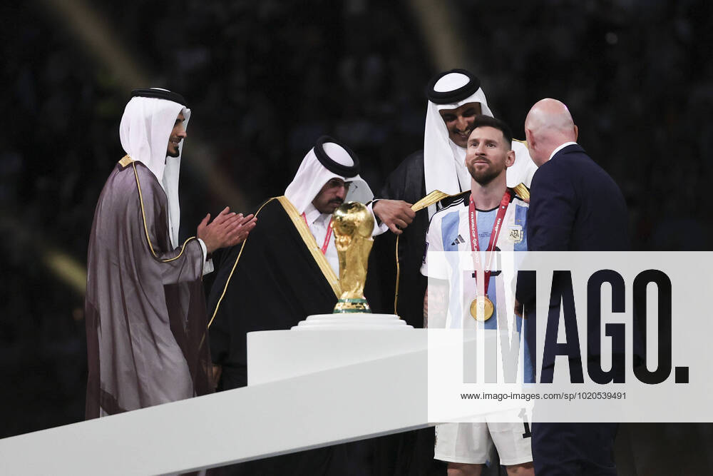 (221219) -- LUSAIL, Dec. 18, 2022 -- FIFA President Gianni Infantino (1st R) and the Emir of Qatar Sheikh Tamim bin Hamad Al Thani (3rd R) award Lionel Messi (2nd R) of Argentina during during the awarding ceremony of the 2022 FIFA World Cup, WM, Weltmeisterschaft, Fussball at Lusail Stadium in Lusail, Qatar, Dec. 18, 2022. ) (SP)QATAR-LUSAIL-2022 WORLD CUP-FINAL-ARG VS FRA CaoxCan