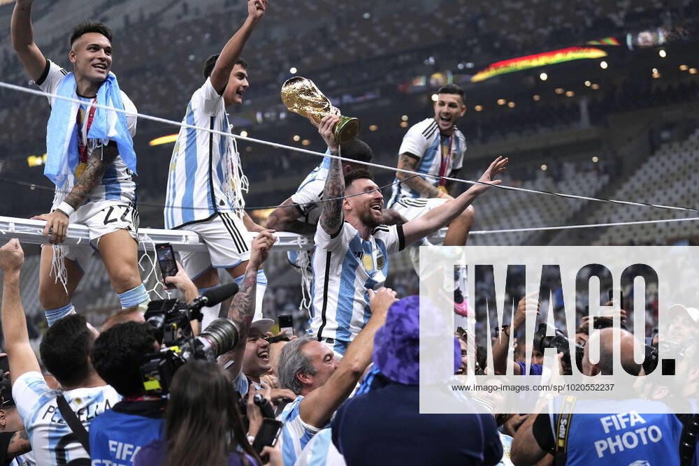 MESSI Lionel World Champion Team Argentina at the award ceremony with the World Cup FIFA World Cup 2022 in Qatar Final Argentina France on 18 12 2022 at Lusail Stadium DFL REGULATES PROHIBIT ANY USE OF PHOTOGRAPHS as IMAGE SEQUENCES and or QUASI VIDEO