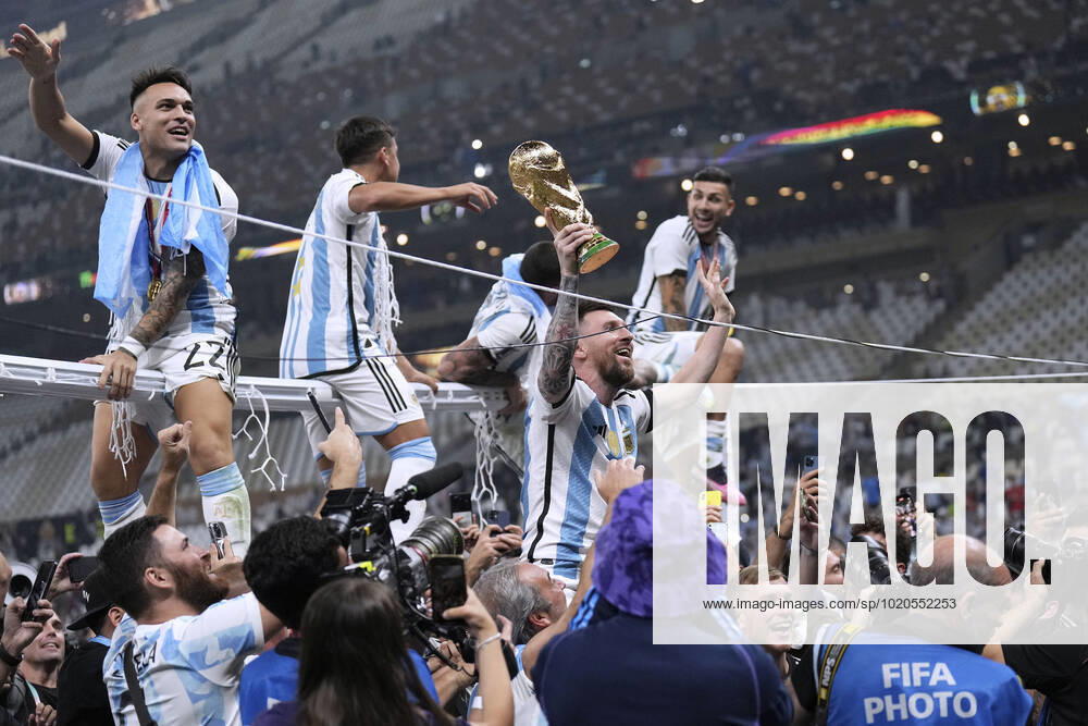 MESSI Lionel World Champion Team Argentina at the award ceremony with the World Cup FIFA World Cup 2022 in Qatar Final Argentina France on 18 12 2022 at Lusail Stadium DFL REGULATES PROHIBIT ANY USE OF PHOTOGRAPHS as IMAGE SEQUENCES and or QUASI VIDEO