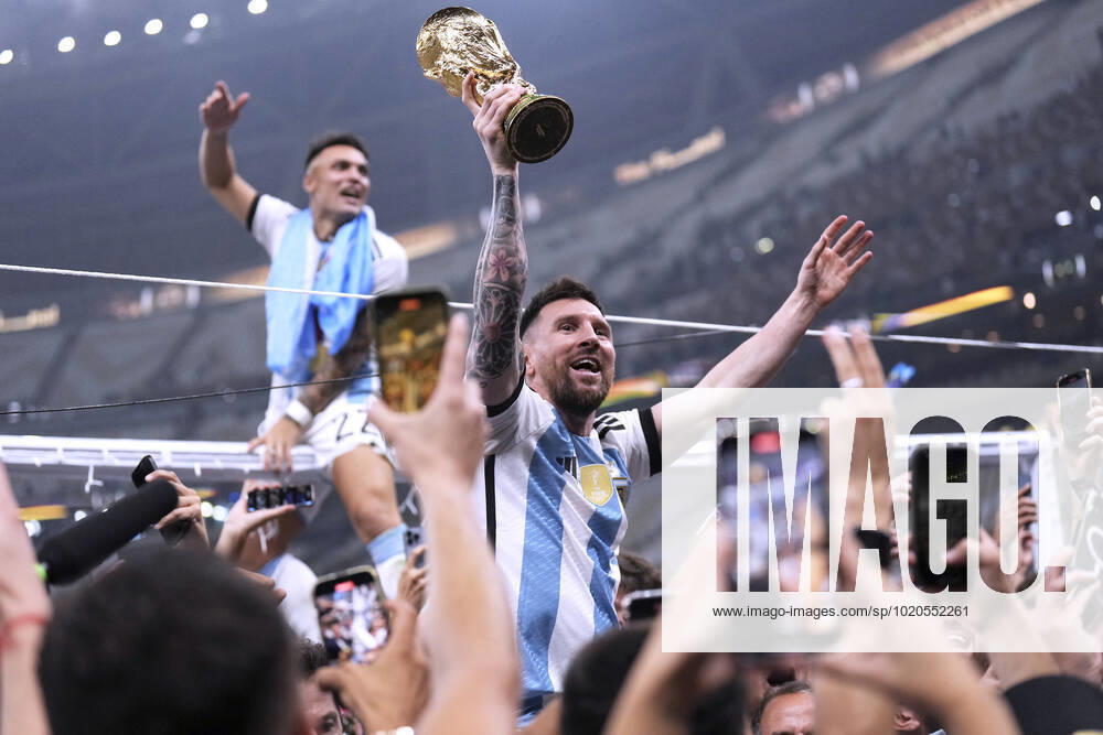 MESSI Lionel World Champion Team Argentina at the award ceremony with the World Cup FIFA World Cup 2022 in Qatar Final Argentina France on 18 12 2022 at Lusail Stadium DFL REGULATES PROHIBIT ANY USE OF PHOTOGRAPHS as IMAGE SEQUENCES and or QUASI VIDEO