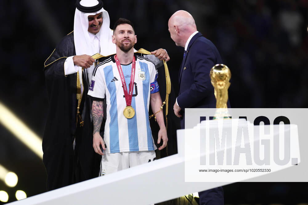 MESSI Lionel World Champion Team Argentina at the award ceremony with FIFA President INFANTINO Gianni and the Emir TAMIN BIN HAMAD AL THANI FIFA World Cup 2022 in Qatar Final Argentina France on 18 12 2022 at Lusail Stadium DFL REGULATIONS PROHIBIT ANY USE OF PHOTOGRAPHS as IMAGE SEQUENCES and or QUASI VIDEO