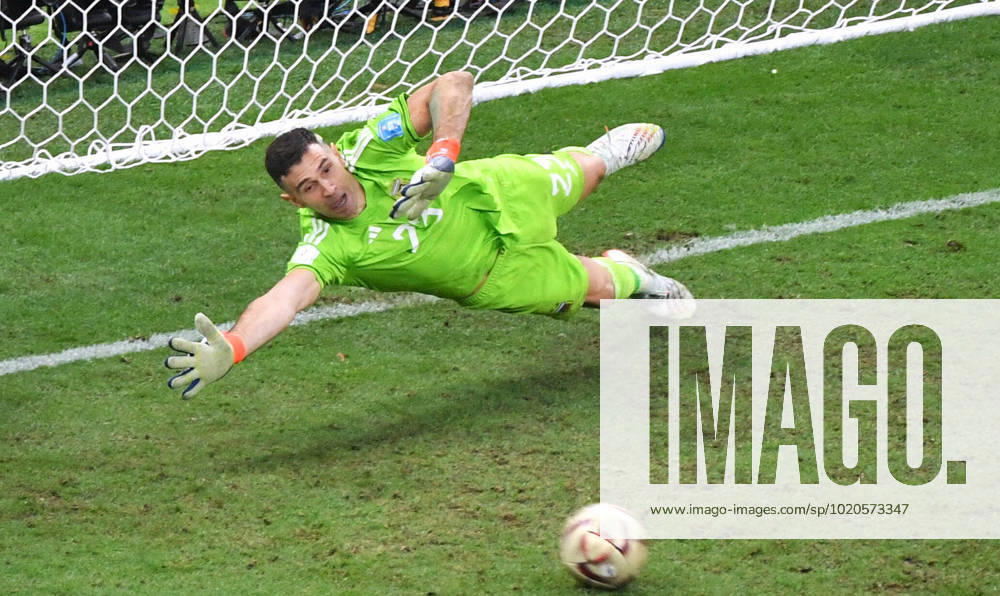 Football World Cup, Men, Qatar 2022, Final, Lusail Iconic Stadium, Argentina France 4 2 n E Emiliano Martinez ARG taking penalty from Aurelien Tchouameni FRA , shooting past goal FIFA REGULATES PROHIBIT ANY USE OF PHOTOGRAPHS AS IMAGE SEQUENCES AND OR QUASI VIDEO