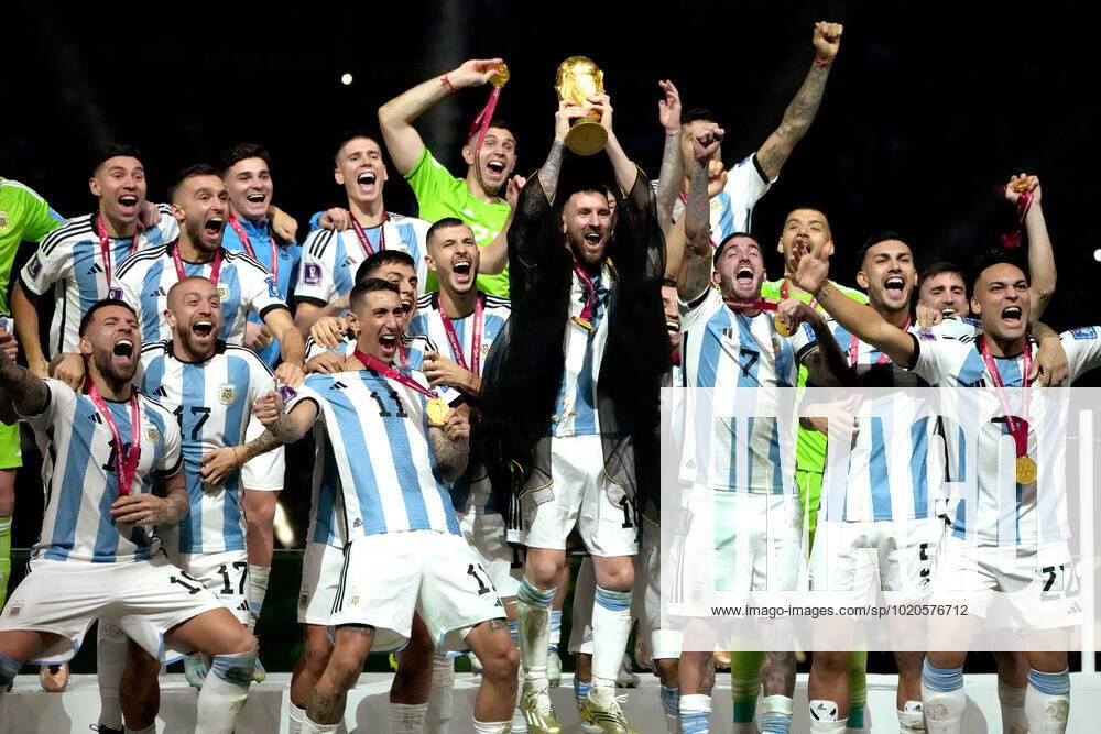 Lionel Messi of Argentina lifts the FIFA World Cup, WM, Weltmeisterschaft, Fussball Trophy after winning the FIFA World Cup Qatar 2022 Final match between Argentina and France at Lusail Stadium on December 18, 2022 in Lusail City, Qatar. WCS