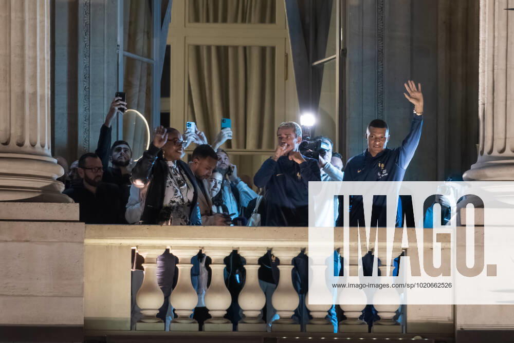 French Football Team Fans Greet The Players On The Place De La Concorde In Paris French football team players Antoine Griezman and Kylian Mbappe wave to the crowd as French football team supporters gather on the Place de la Concorde with French flags to welcome the players on the balcony of the Hotel de Crillon after their return from Qatar following their defeat against Argentina in the World Cup final in Paris on December 19, 2022. Paris France
