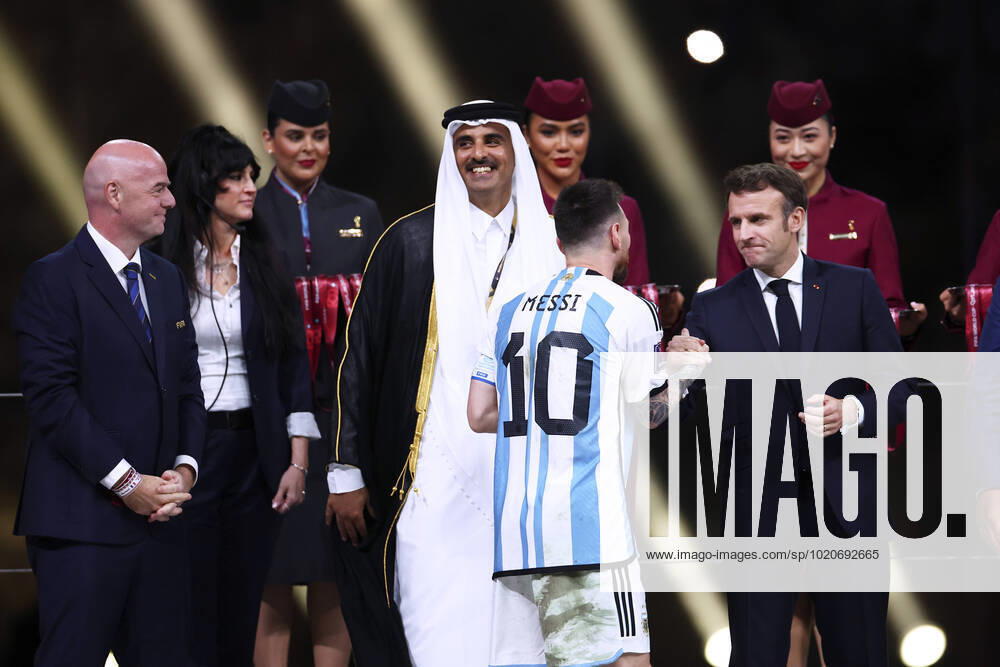 MESSI Lionel World Champion Team Argentina at the award ceremony with FIFA President INFANTINO Gianni and the Emir TAMIN BIN HAMAD AL THANI FIFA World Cup 2022 in Qatar right President MACRON Emmanuel Final Argentina France on 18 12 2022 at Lusail Stadium DFL REGULATIONS PROHIBIT ANY USE OF PHOTOGRAPHS as IMAGE SEQUENCES and or QUASI VIDEO