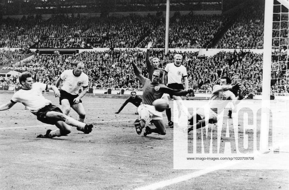 1966 World Cup Final Just a few seconds to go in the World Cup Final and West Gemany s Wolfgang Weber side-foots the ball past England s Gordon Banks, Goalkeeper, to snatch the eualiserat Wembley Stadium July 30th 1966. In the extra time that followed, England scored twice to end up 4-2 winners. Also in this picture are West German captain Uwe Seeler (second left) England s Ramon Wilson (dark shirt); behind Wilson is Moore, the England captain; Schnellinger (white shirt) and in the background extreme right, Jackie Charlton. Just seen in hte background centre, is George Cohen, the other England pull back. 30 July 1966