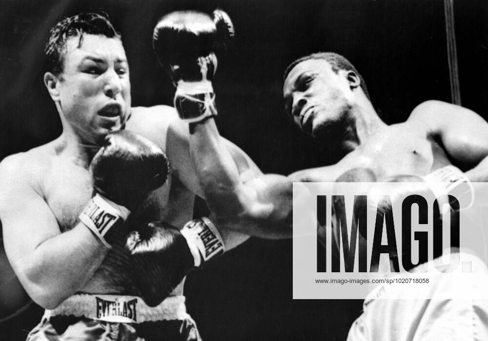 Joe Frazier Joe Frazier (right) misses a right to the head of Canadian heavyweight George Chuvalo during the first round of their scheduled 12-round contest . Frazier won with a technical knockout when the referee stopped the contest in the fourth round . 20th July 1967 United States