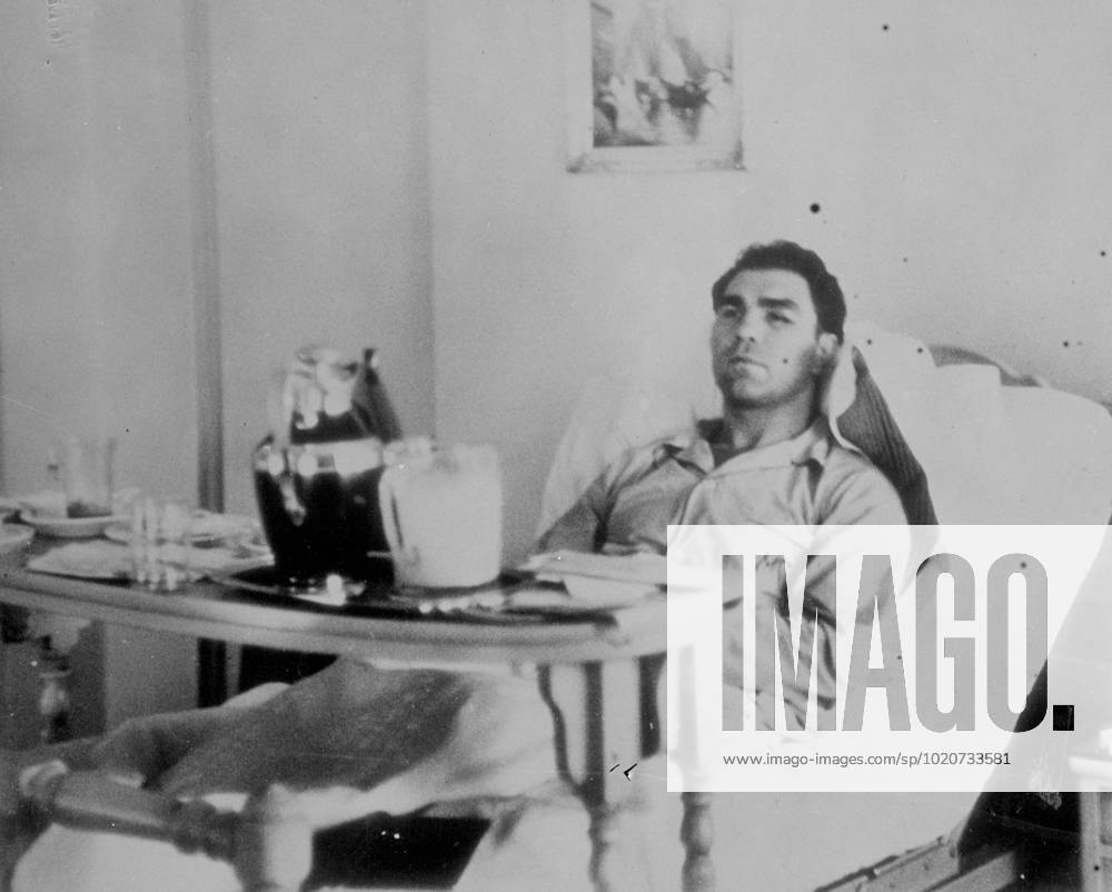 Max Schmeling in Hospital after First Round defeat by Louis. Following his defeat by Joe Louis in the first round of their World Title match in New York, Max Schmeling, the German heavyweight, was taken to hospital with a back injury. It was alleged that the injury was caused by a foul blow, but was later denied. Photo shows, Max Schmeling resting in bed in the New York Polyclinic hospital. 3 July 1938 United States