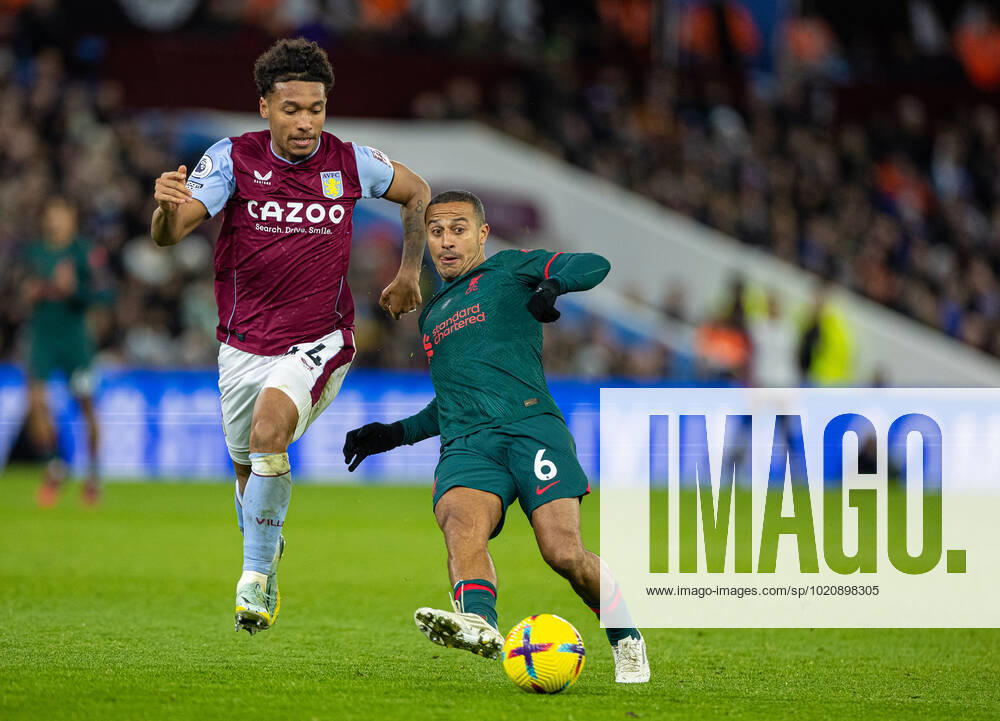 Football - FA Premier League - Aston Villa FC v Liverpool FC BIRMINGHAM, ENGLAND - Monday, December 26, 2022: Liverpool s Thiago AlcÃ¢ntara (R) gets away from Aston Villa s Boubacar Kamara during the FA Premier League match between Aston Villa FC and Liverpool FC at Villa Park. BIRMINGHAM Villa Park WEST MIDLANDS ENGLAND
