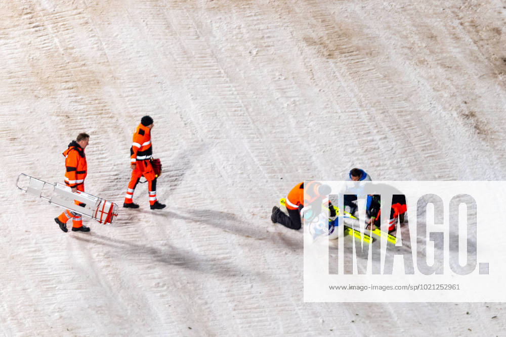 KW52 Ski jumping, Skispringen, Ski, nordisch - FIS WC Ljubno LJUBNO,SLOVENIA,01.JAN.23 - NORDIC SKIING, SKI JUMPING - FIS World Cup, Silvester Tournament, ladies, normal hill. Image shows Ursa Bogataj (SLO) and medics. GEPAxpictures Klansek
