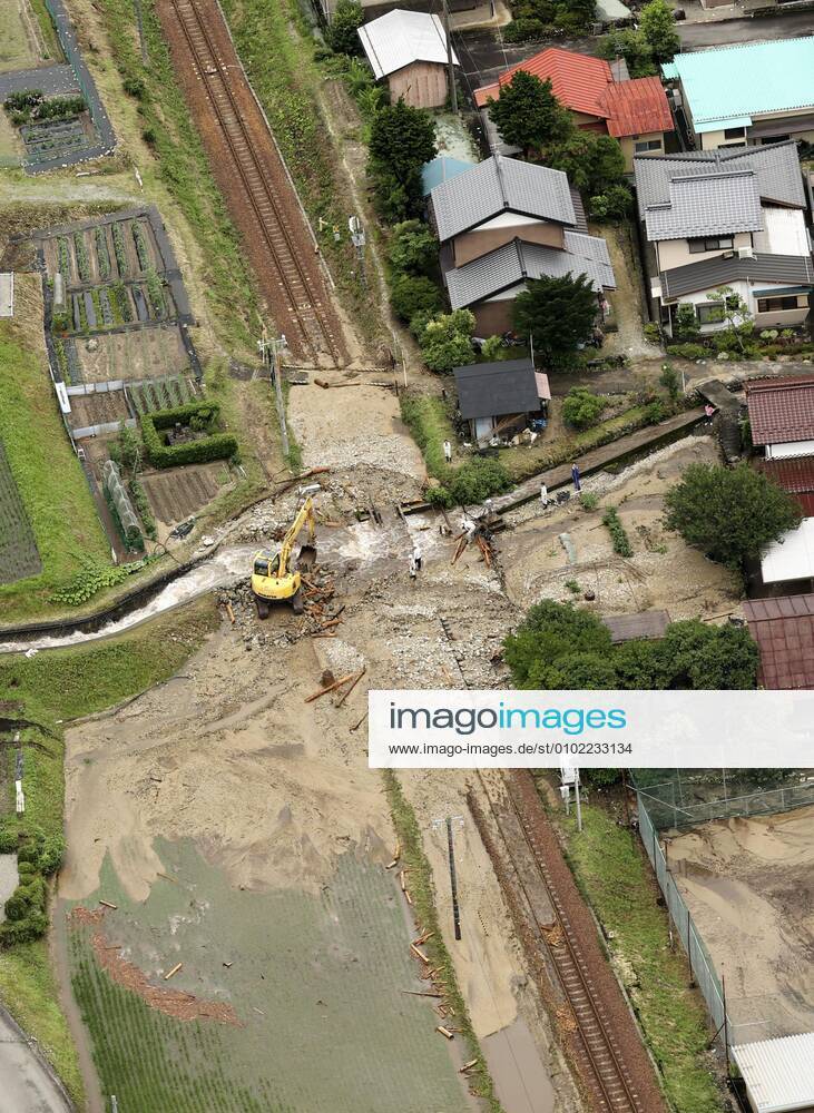Torrential rain in central Japan Photo taken from a Kyodo News helicopter on July 8, 2020, shows a mud-covered railroad in Gero in Gifu Prefecture, central Japan, following torrential rain.