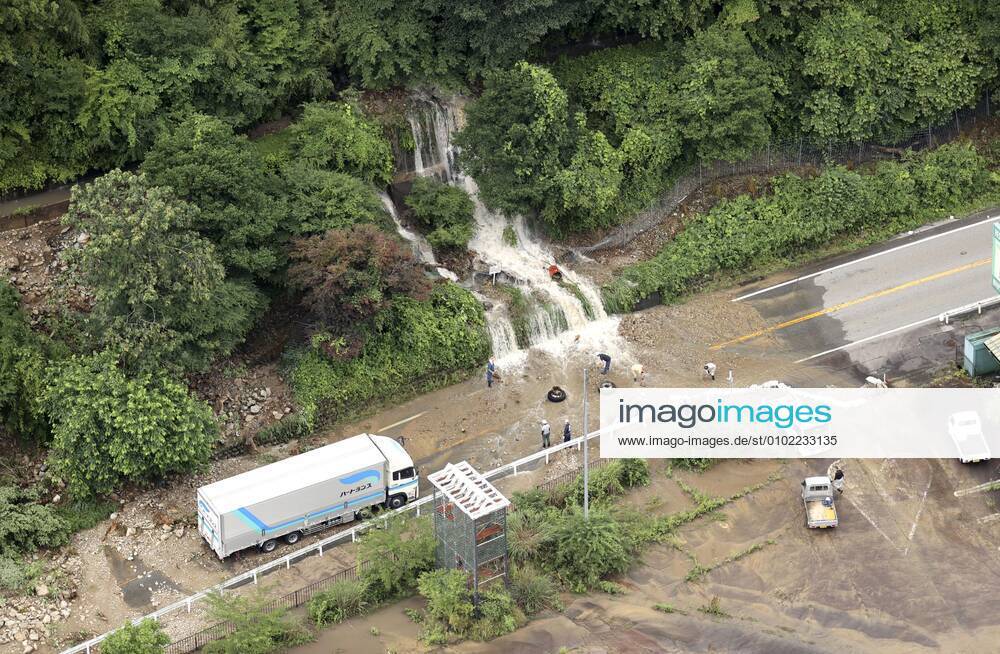 Torrential rain in central Japan Photo taken from a Kyodo News helicopter on July 8, 2020, shows a mud-covered road in Gero in Gifu Prefecture, central Japan, following torrential rain.