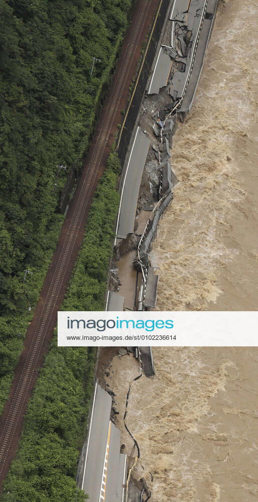 Torrential rain in central Japan Photo taken from a Kyodo News helicopter on July 8, 2020, shows a collapsed section of national road Route 41 after torrential rain caused the Hida River in Gero in Gifu Prefecture, central Japan, to swell.