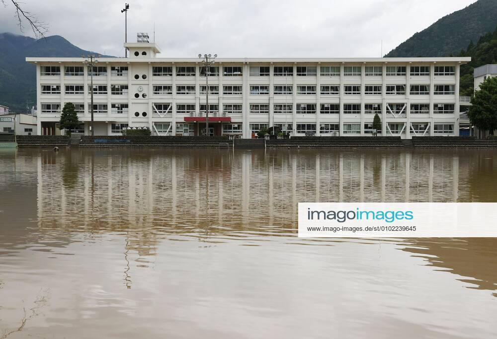 Torrential rain in central Japan Photo shows an inundated school ground in Gero in Gifu Prefecture after torrential rain lashed central Japan.