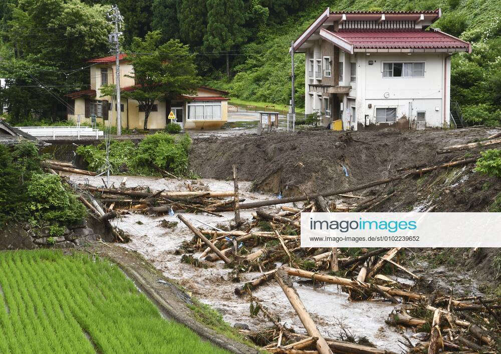 Torrential rain in central Japan Photo taken on July 8, 2020, shows the site of a mudslide in Takayama in Gifu Prefecture after torrential rain lashed central Japan.