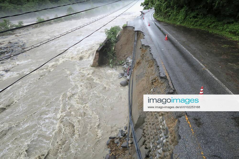 Torrential rain in central Japan Photo taken July 9, 2020, shows a collapsed section of a national road in Takayama in Gifu Prefecture, central Japan, following torrential rain.
