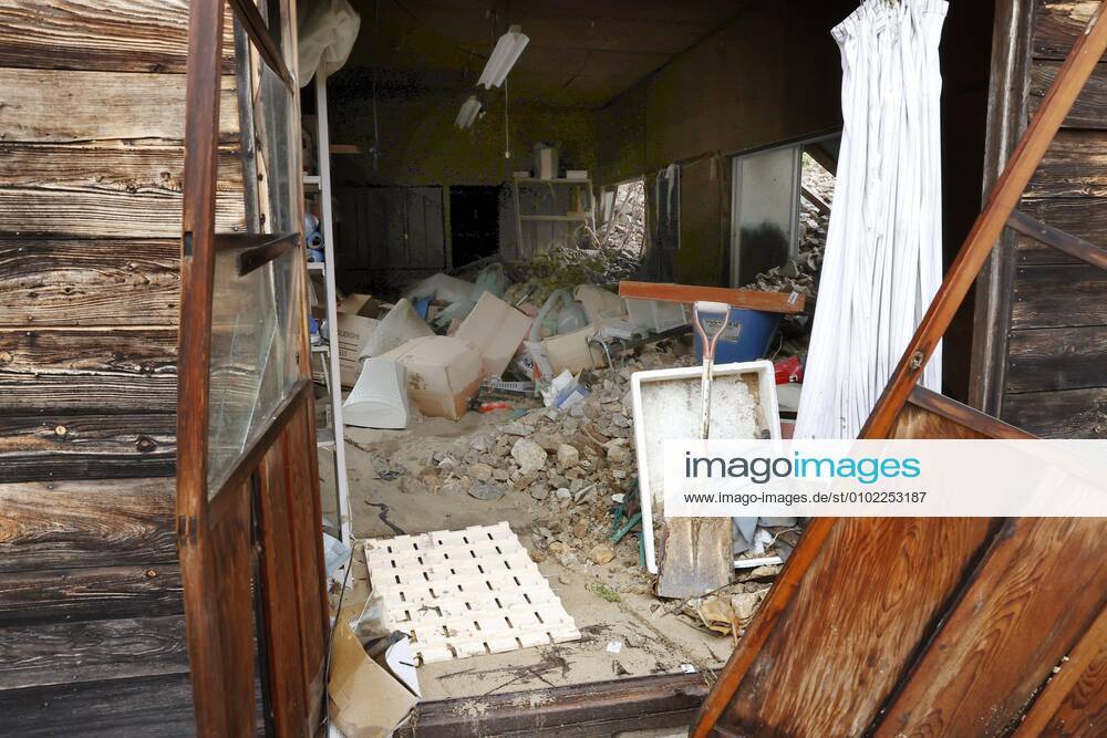 Torrential rain in central Japan Photo taken July 9, 2020, shows a house damaged by a mudslide following torrential rain in Gero in Gifu Prefecture, central Japan.