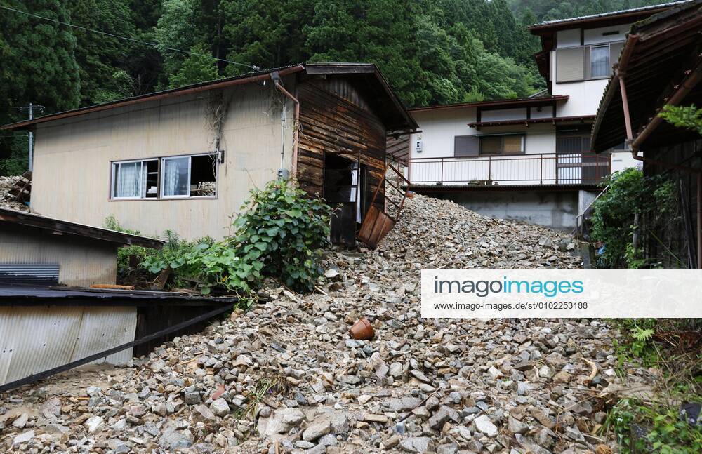 Torrential rain in central Japan Photo taken July 9, 2020, shows a house damaged by a mudslide following torrential rain in Gero in Gifu Prefecture, central Japan.