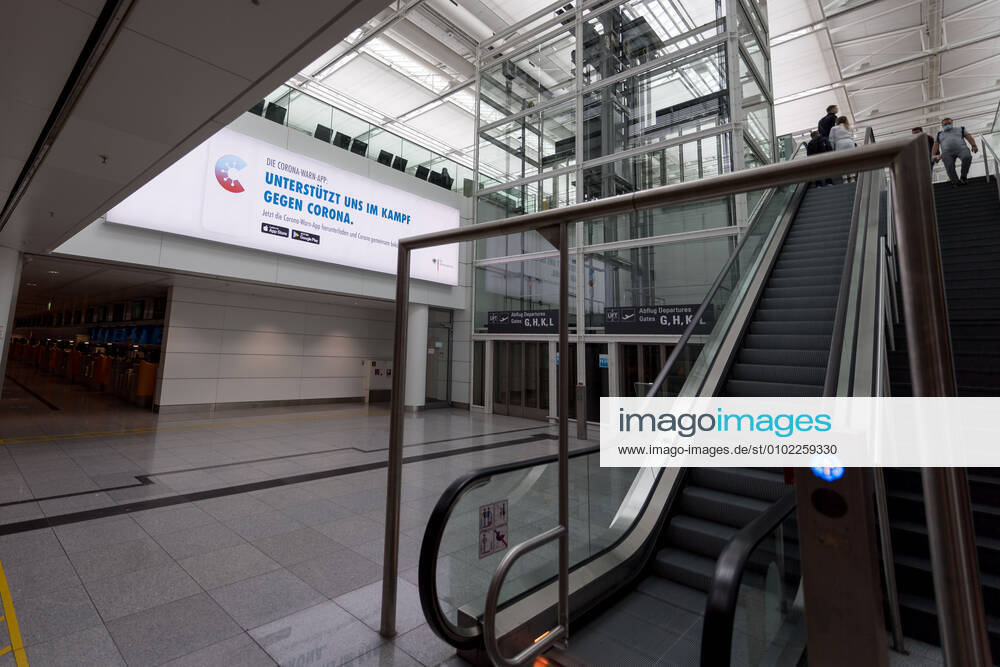 Effects Corona Munich Airport In picture Advertising board Terminal 2 T2 Corona Warn App Munich Airport Bayer Germany
