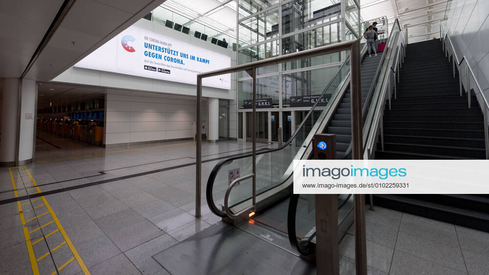 Effects Corona Munich Airport In picture Advertising board Terminal 2 T2 Corona Warn App Munich Airport Bayer Germany