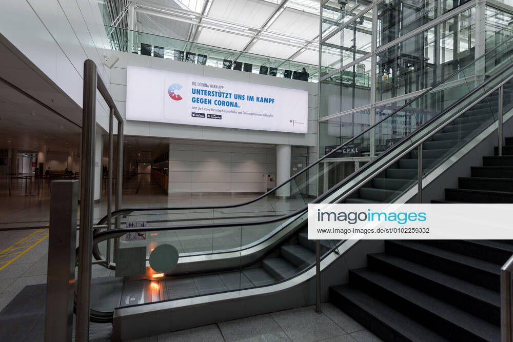 Effects Corona Munich Airport In picture Advertising board Terminal 2 T2 Corona Warn App Munich Airport Bayer Germany