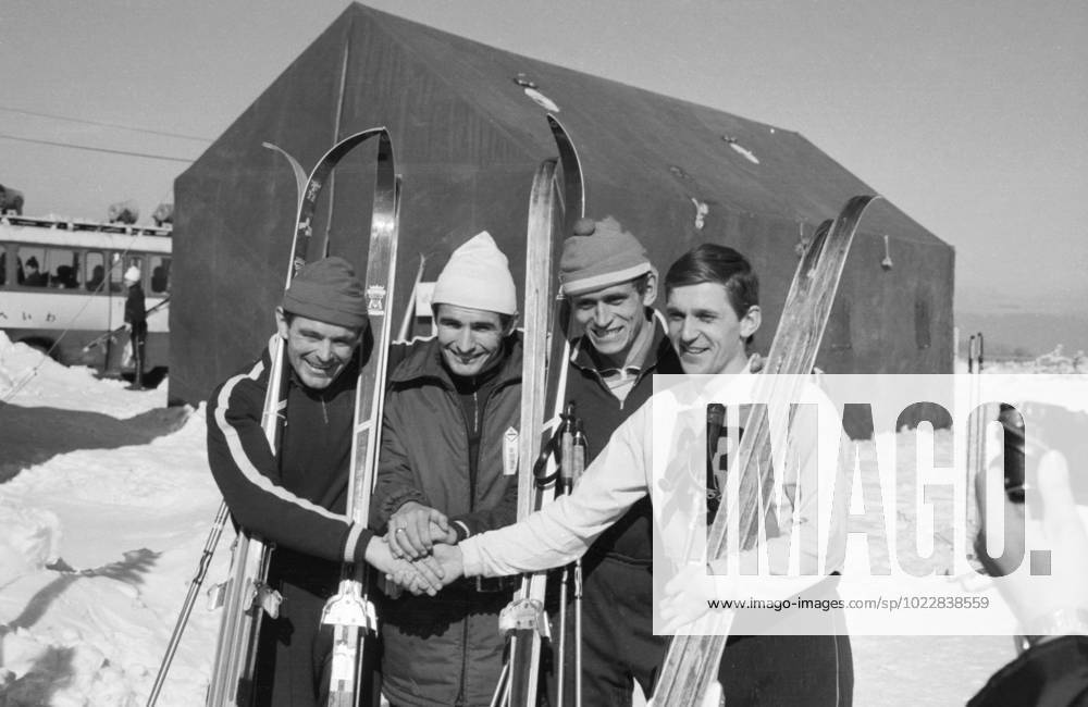 Sapporo, Japan. February 8, 1971. Soviet cross-country skiers Vyacheslav Vedenin, Fyodor Simashev, Yuri Skobov and biathlete Alexander Tikhonov (L-R) pose for a photo after competing in the 4x10 kilometre relay cross-country skiing event at the 1972 Winter Olympics pre-Olympic week in Sapporo. Gennady Rakhovetsky TASS 32431417