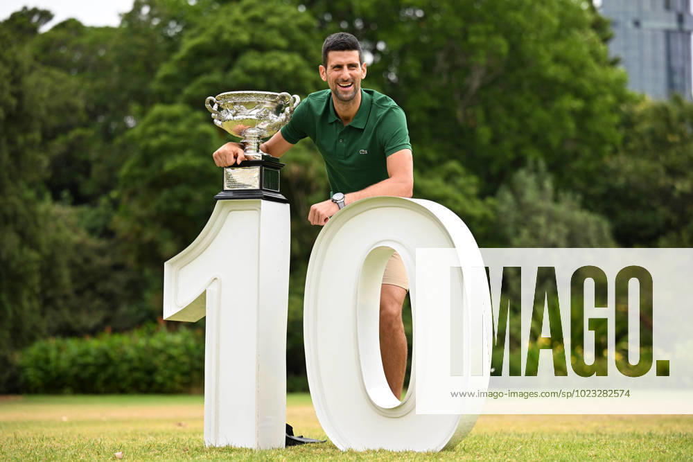 KW05 TENNIS AUSTRALIAN OPEN MENS SINGLES WINNER, Novak Djokovic of Serbia poses for a photograph with the Norman Brooks Challenge Cup following his win in the men?s singles final in the 2023 Australian Open tennis tournament, at Government House in Melbourne, Monday, January 30, 2023. ( NO ARCHIVING, , NO USE IN BOOKS WITHOUT CONSENT MELBOURNE VICTORIA AUSTRALIA