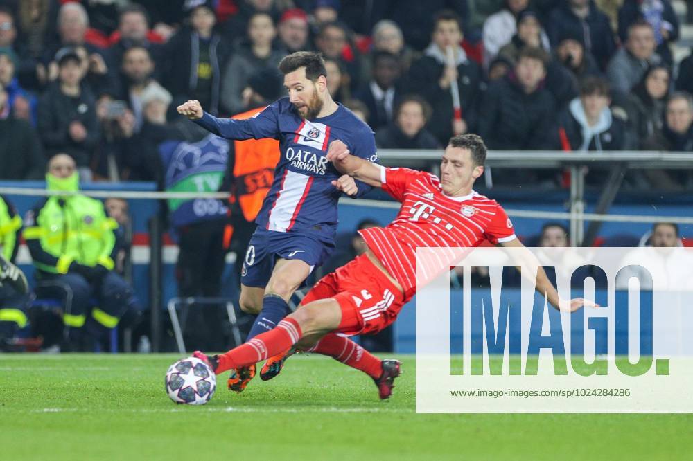 L r in duel, action, with Lionel Messi 30 Paris Saint Germain and Benjamin Pavard 5 FC Bayern Muenchen , foul, Paris Saint Germain vs FC Bayern Muenchen, Champions League, Football, Round of 16, 14 02 2023 Paris Paris France