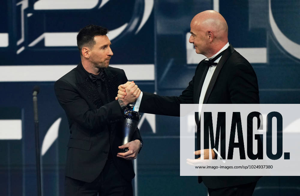 (230228) -- PARIS, Feb. 28, 2023 -- Argentina s Lionel Messi (L) greets FIFA President Gianni Infantino after receiving the Best FIFA Men s Player Award during the Best FIFA Football Awards 2022 ceremony in Paris, France, Feb. 27, 2023. (Photo by Xinhua) (SP)FRANCE-PARIS-FOOTBALL-BEST FIFA MEN S PLAYER AWARD-MESSI GlennxGervot