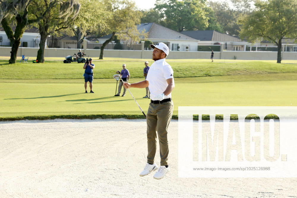 ORLANDO, FL - MARCH 03: PGA, Golf Herren golfer Xander Schauffele jumps up to see over the front of a fairway bunker on the 12th hole during the second round of the Arnold Palmer Invitational on March 3, 2023 at Arnold Palmer s Bay Hill Club and Lodge in Orlando, Florida. (Photo by Brian Spurlock Icon Sportswire) GOLF: MAR 03 PGA - Arnold Palmer Invitational presented by Mastercard Icon23030340