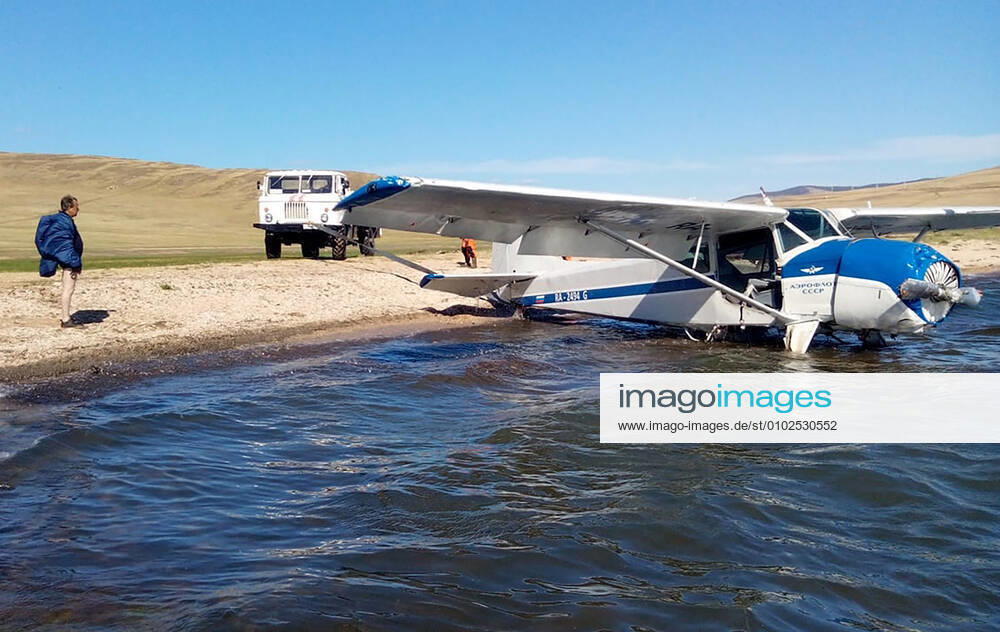 A private light aircraft Yakovlev Yak-12A is being recovered from the water after making an emergency landing in the Maloye More Strait of Lake Baikal between the mainland and Olkhon Island. The aircraft was carrying four people, all of whom have survived. The aircraft glided from an altitude of 300 metres and landed 3 metres from the shore. Emercom Baikal Search and Rescue Team TASS TS0E06C4