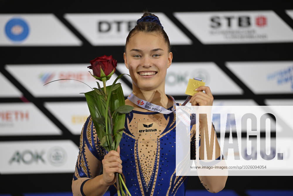 Jessica Schlegel GER wins gold medal on balance beam award ceremony honor joy happiness jubilation shows medal gymnastics 38 EnBW DTB Pokal DTB Pokal Stuttgart Porsche Arena 17 19 03 2023 gymnastics EnBW DTB Pokal